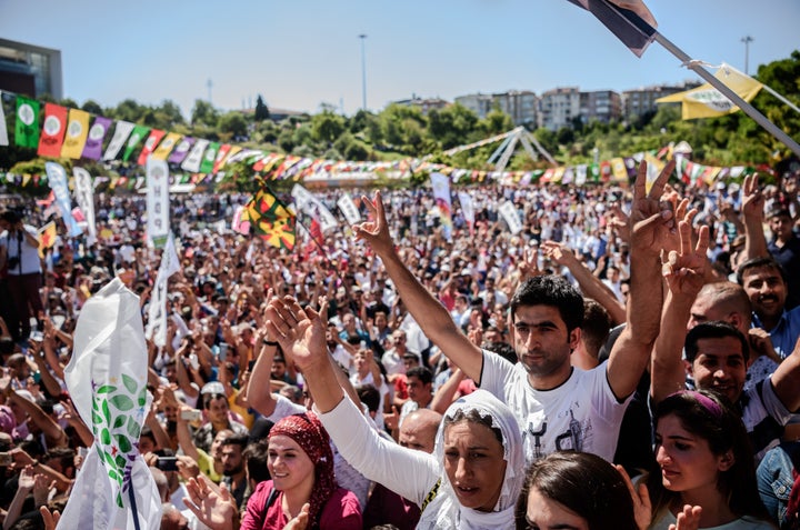 Kurds rally against military coup and the state of emergency in Istanbul on Saturday. Erdogan imposed the state of