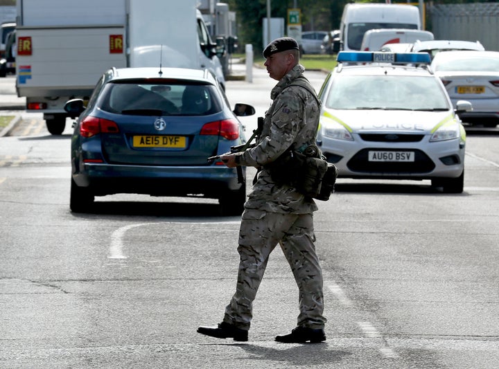 <strong>An armed guard at RAF Marham in Norfolk, after a serviceman was threatened with a knife near to the base</strong>