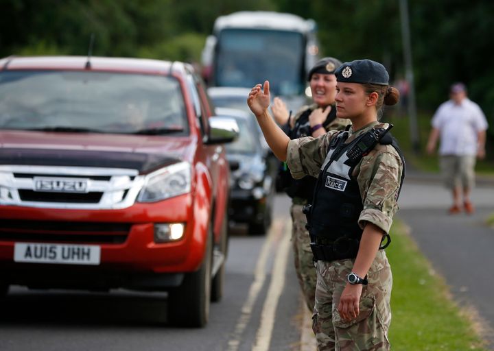 <strong>Royal Air Force police control traffic at the base on Thursday</strong>