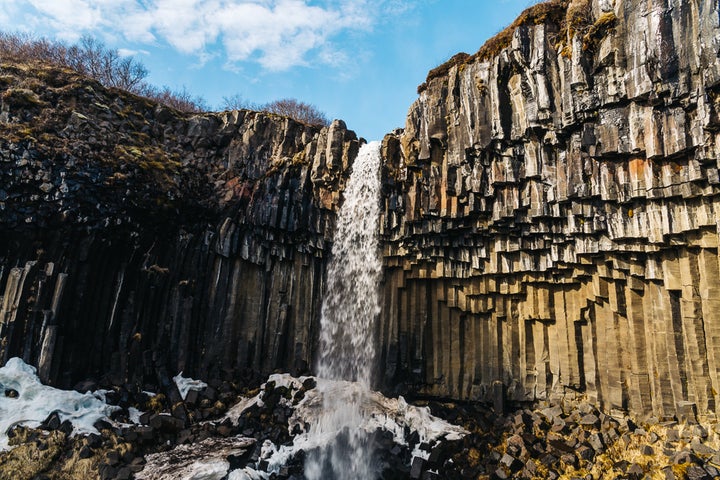 SVARTIFOSS WATERFALL AT SKAFTAFELL NATIONAL PARK