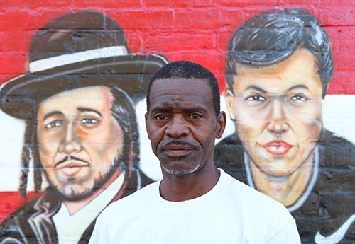 <i>Photo by Nancy A. Ruhling</i><br><strong>The mural shows the faces of the community.</strong>