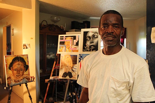 <i>Photo by Nancy A. Ruhling</i><br><strong>Ron's living room is his art studio.</strong>