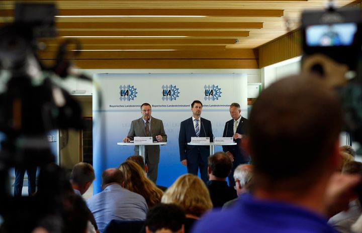 President of the Bavarian State Office of Criminal Investigation Robert Heimberger (L-R), Senior Prosecutor Thomas Steinkraus-Koch and Munich's police vice-superintendent Werner Feiler attend a news conference after a shooting rampage