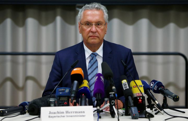 Bavarian Interior Minister Joachim Herrmann addresses a news conference after an explosion in Ansbach