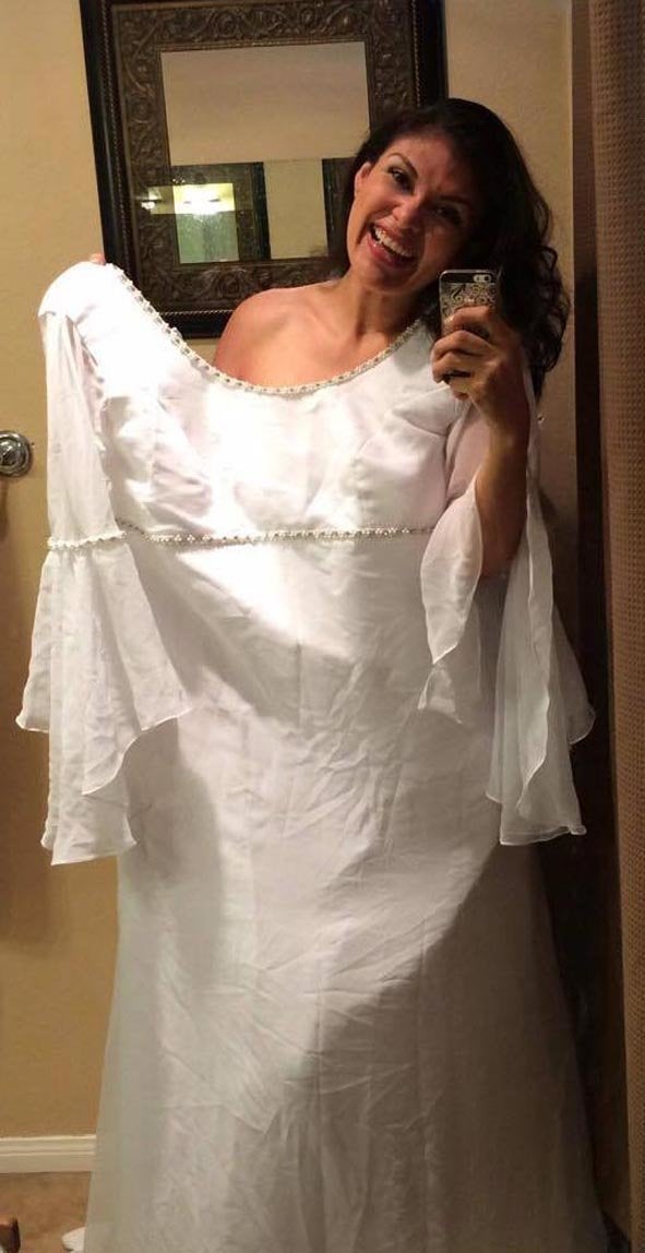 Monica Perez in her wedding dress, which is now twice her size.