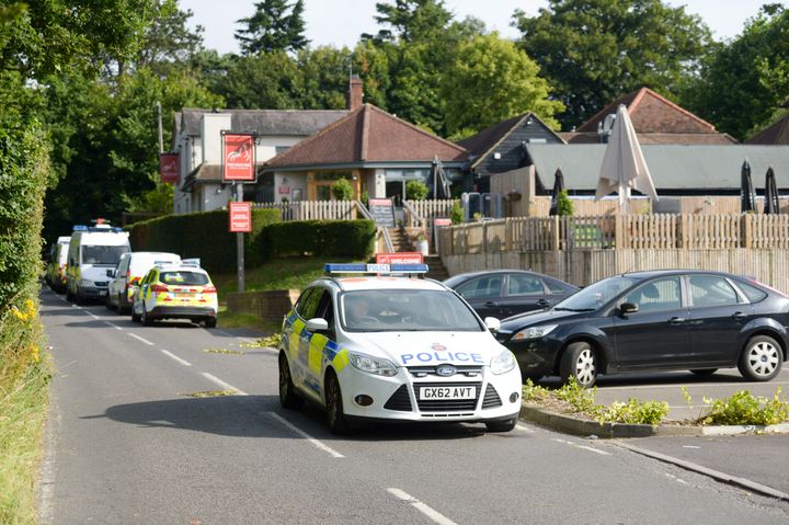 Surrey Police have launched a murder investigation after the body of a man in his thirties was discovered at an address in Headley