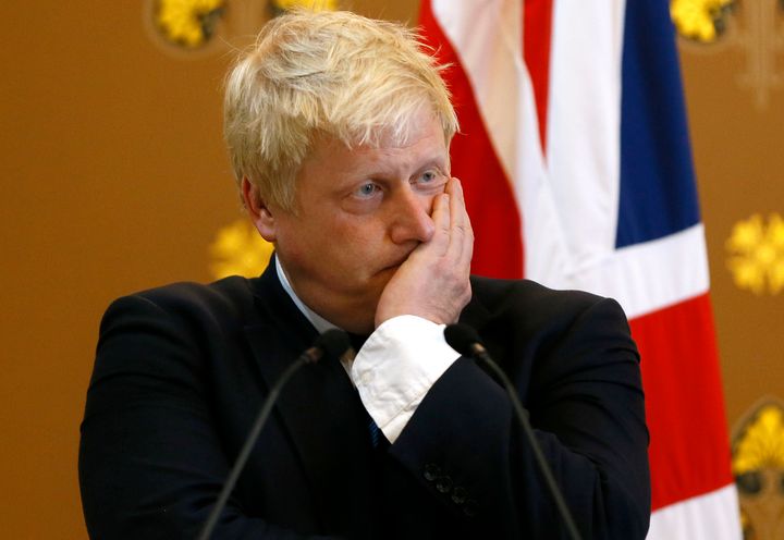 Foreign Secretary Boris Johnson listens during a press conference with US secretary of state John Kerry (unseen) at the Foreign Office in London.