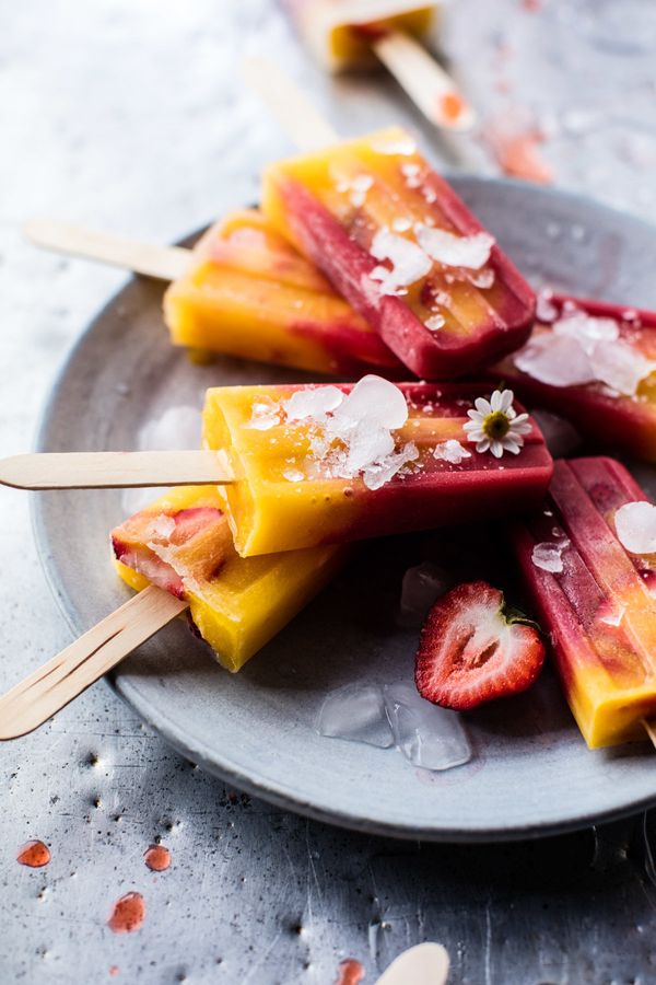 <strong>Get the <a href="http://www.halfbakedharvest.com/3-ingredient-strawberry-mango-popsicles/" target="_blank">3-Ingredie