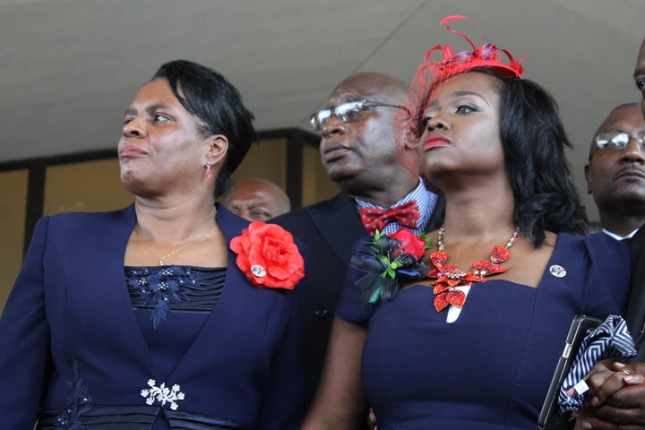 Trenisha Jackson, right, wife of slain Baton Rouge police officer Montrell Jackson, attends the funeral for her husband on Monday.