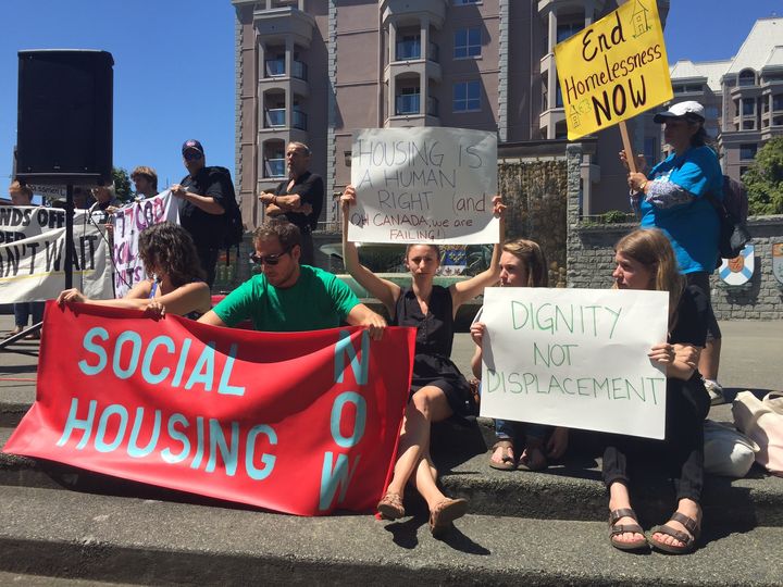 Housing advocates rally during the National Housing Strategy meeting in Victoria.