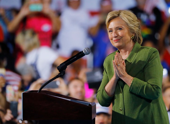 Hillary Clinton on Tuesday became the first woman to top a major U.S. political party's ticket for the White House. 