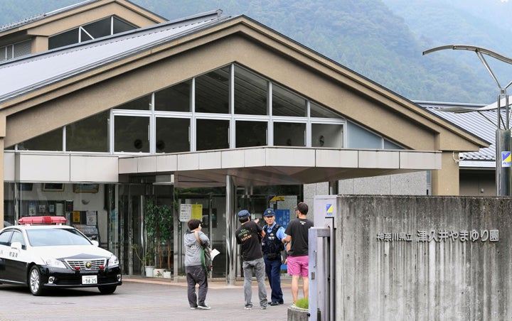 A police officer is seen near a facility for the disabled where a knife-wielding man attacked, in Sagamihara, Kanagawa prefecture.