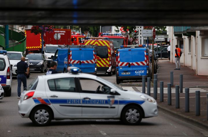 Two knifemen were killed by police after they took several people hostage in a French church.