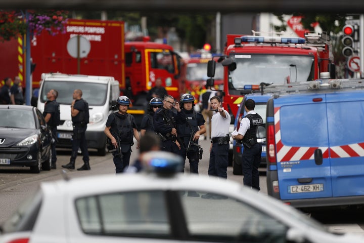 The knife attackers took five people hostage inside the church in the Normandy town of Saint-Etienne-du-Rouvray. 