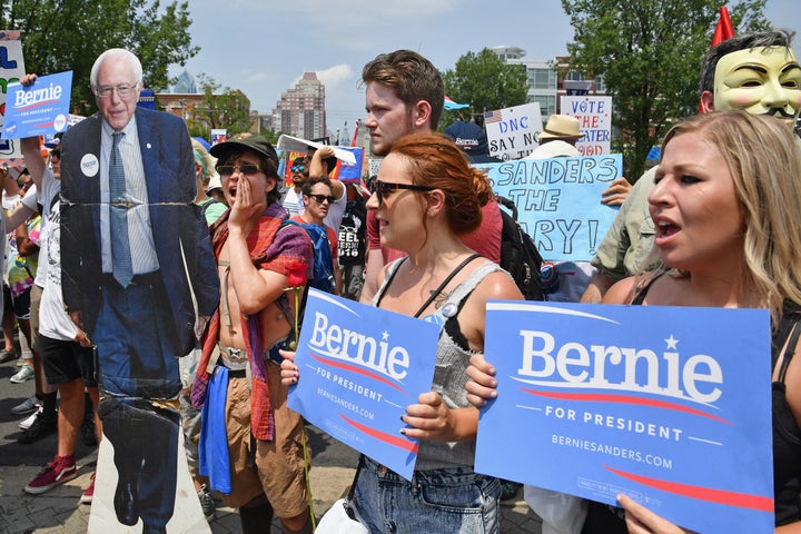 Bernie Sanders supporters march at the Democratic National Convention on July 25, 2016 to show their unwavering sup