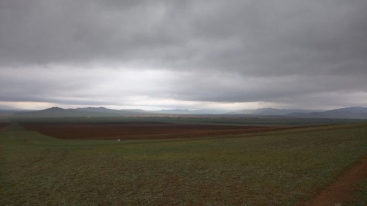 Mongolia's landscape stretches endlessly into the far off horizon