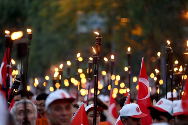 People march against Gulen in Istanbul on Monday. The scale of the arrests and suspensions following the coup attempt have raised concerns among rights groups.