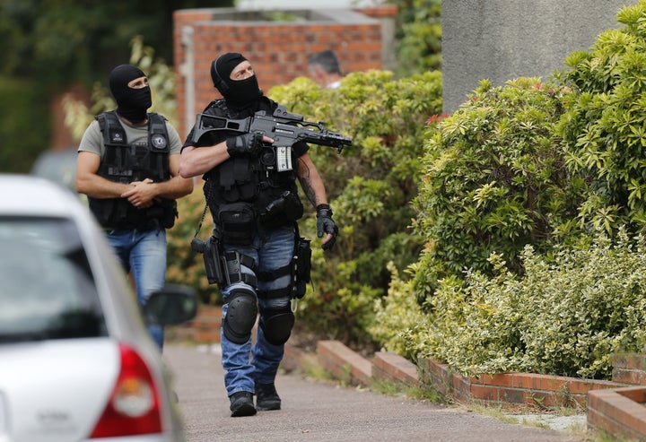 French policemen stand in the street