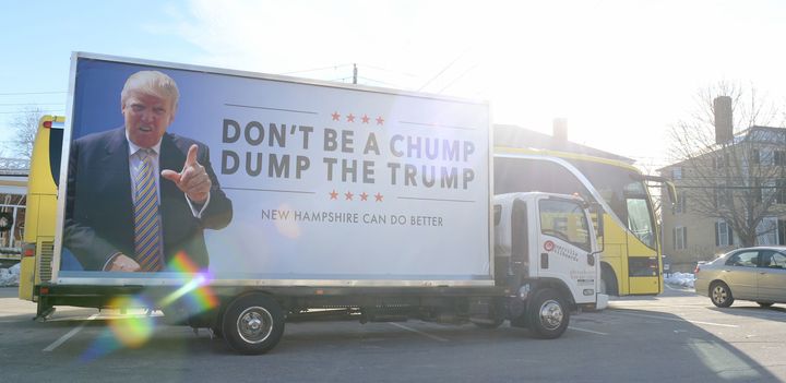 An anti-Trump billboard is seen outside of Exeter Town Hall where then-Republican presidential candidate Ted Cruz spoke on January 20, 2016, in New Hampshire.