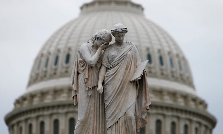 The statue of Grief and History in front of the U.S. Capitol Dome in Washington.