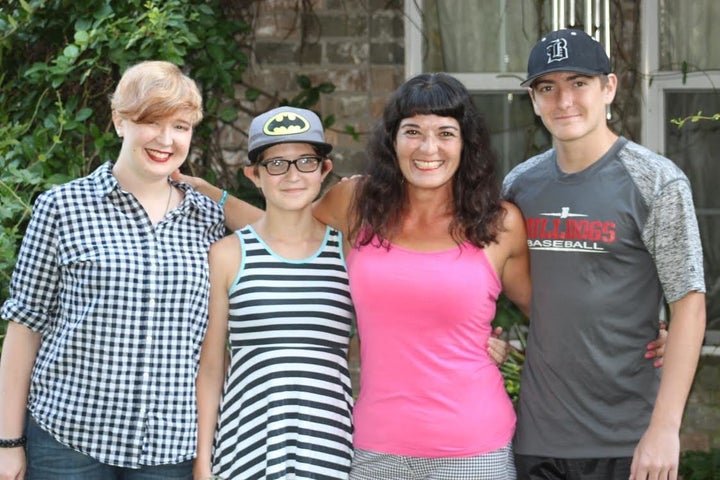 Herrera and her three children today. 