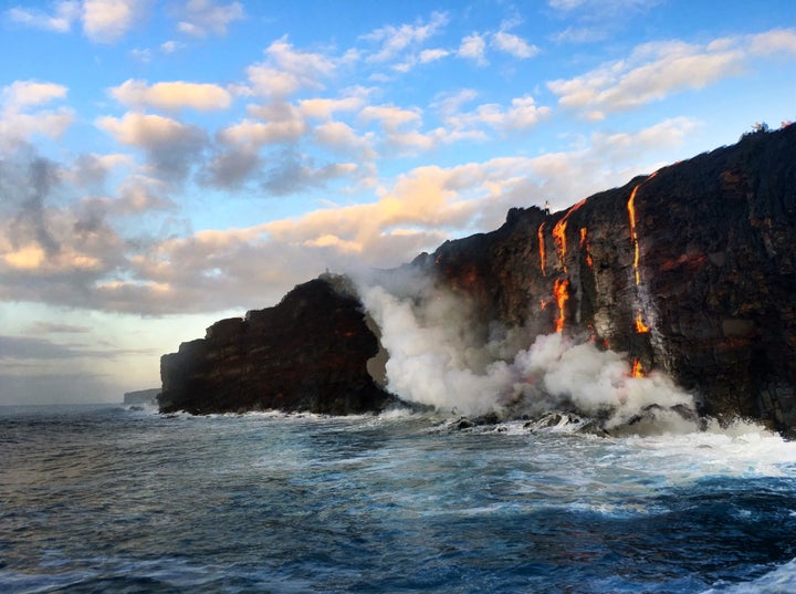 Lava flows into the ocean in Hawaii.