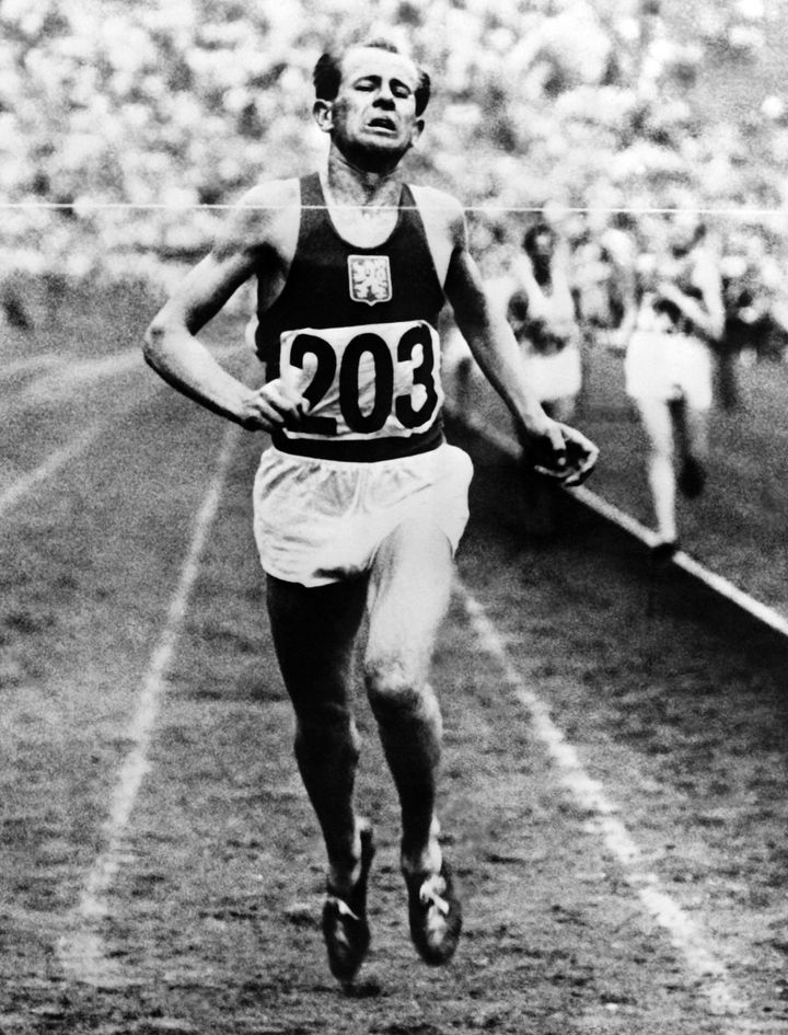 Emil Zatopek, wearing his trademark look of pain, at the Olympics