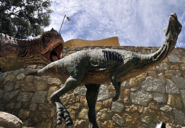 Models of Abelisaurus dinosaurs on display at the Cretaceous Park in Cal Orcko, hill in Sucre