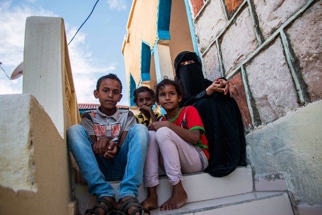 Thirteen-year-old Salim (far left) sits with his siblings in their temporary accommodation in Hargeisa, capital of Somaliland. Salim saw his friend's face blown off when he picked up a grenade in Yemen in 2015. Salim's mother Daifa says her son hasn't been the same since the incident. Daifa herself has a chronic blood pressure problem, but can't afford treatment in Somaliland.