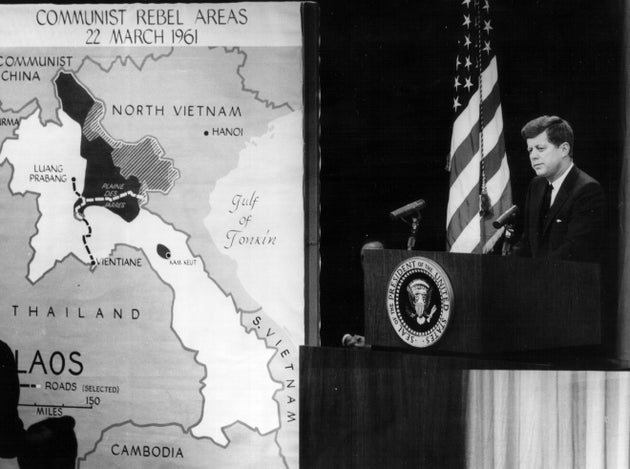 President John F. Kennedy speaks at a press conference about North Vietnam in 1961, the year he sent...