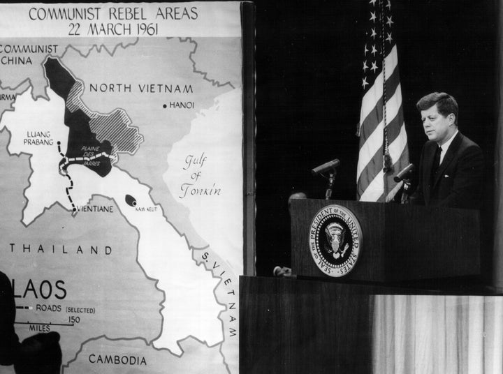 President John F. Kennedy speaks at a press conference about North Vietnam in 1961, the year he sent the first large force of U.S. military personnel to Vietnam.