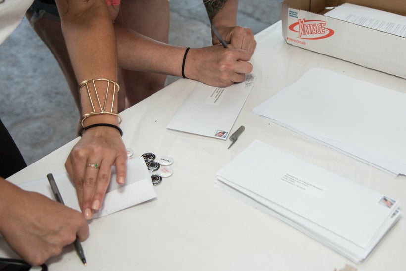 Women writing letters for the Recall Aaron Persky campaign.