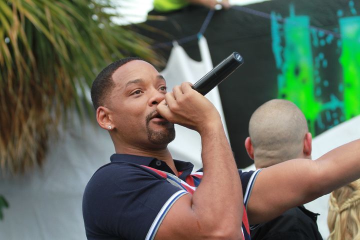 Will Smith performs at the "Suicide Squad" Wynwood Block Party and mural reveal with the cast on July 25, 2016, in Miami, Florida.