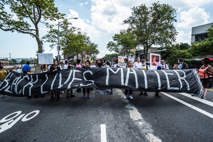 Protesters rally to speak out against the unjust police killings of black men and women. 