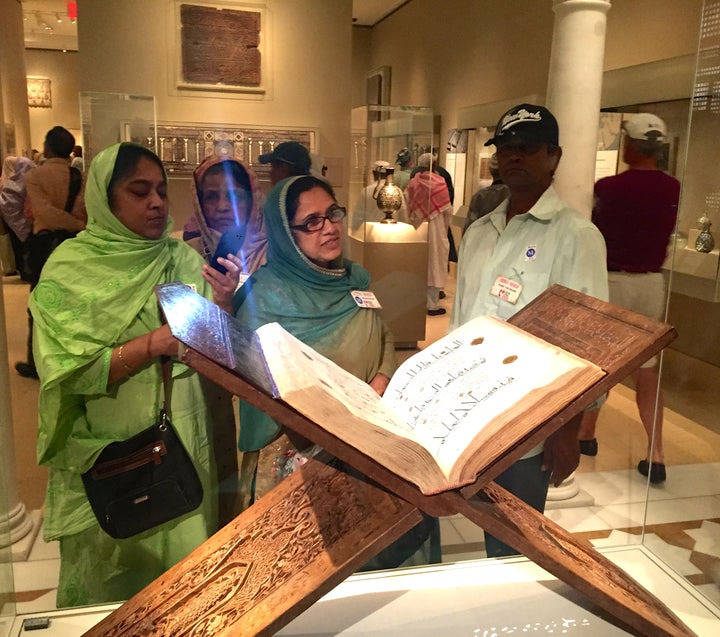 Bangladeshi seniors from the Desi Senior Center in Jamaica, NY, admire an ancient Koran on a visit to the Metropolitan Museum. Senior centers are about socialization and sharing. But for South Asians, the realization that seniors need much more than just being fed and clothed by their well-heeled sons and daughters, “is happening slowly.”