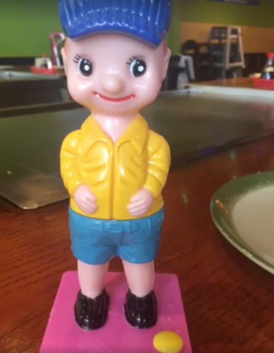 This toy doll squirts water when its pants are pulled down.