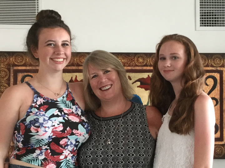 Frances Wallace with her two daughters Daniella, 16, (L) and Francesca, 13 (R). 