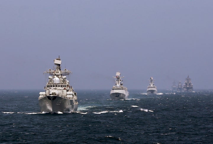 Chinese and Russian naval vessels participate in the Joint Sea-2014 naval drill outside Shanghai on the East China Sea, May 2