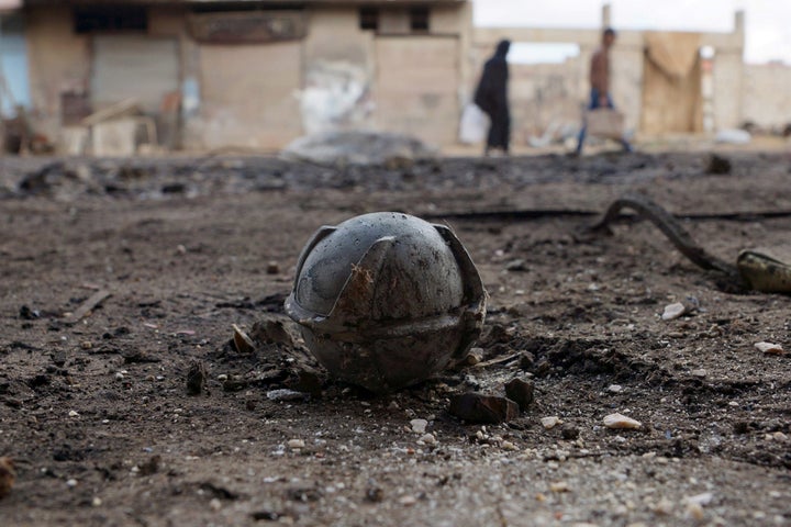 More than 100 countries have banned cluster munitions like this unexploded bomblet, pictured in Syria's Deraa province in Feb