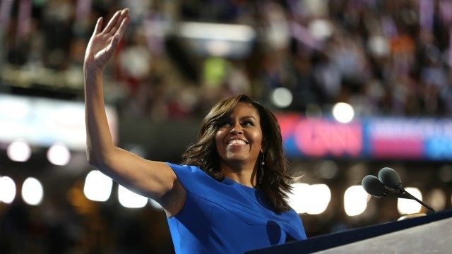 First lady Michelle Obama waves before delivering her remarks at the Democratic National Convention