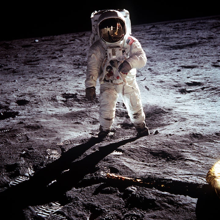 This NASA file image shows Apollo 11 U.S. astronaut Buzz Aldrin standing on the Moon, next to the Lunar Module "Eagle" (R), J