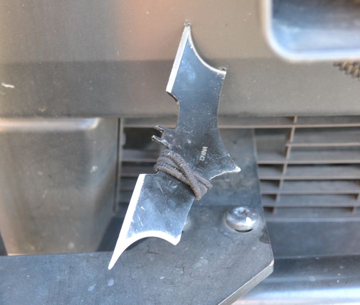 This sharp, bat-shaped weapon known as a "batarang" was found embedded in the front of a Seattle police SUV following a chase on Monday, authorities said.