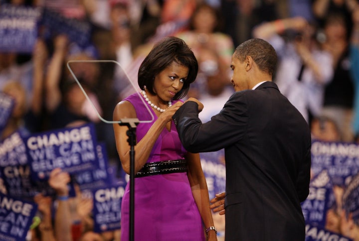 Barack Obama and his wife Michelle Obama bump fists after clinching the Democratic presidential nomination in 2008.