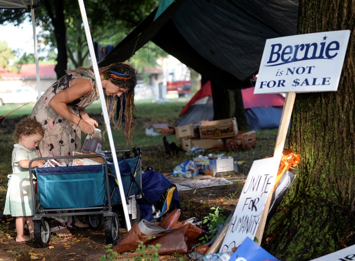 A supporter of Sen. Bernie Sanders reorganizes her camp in Philadelphia, July 26, 2016.