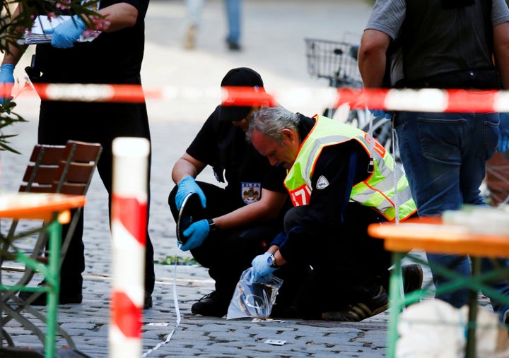 Police secure the area after an explosion in Ansbach, Germany, July 25, 2016. A suicide bomber who pledged allegiance to ISIS injured 15 people after detonating a bomb outside a German music festival.