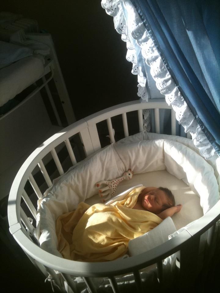 Maddox in his crib at one and a half months