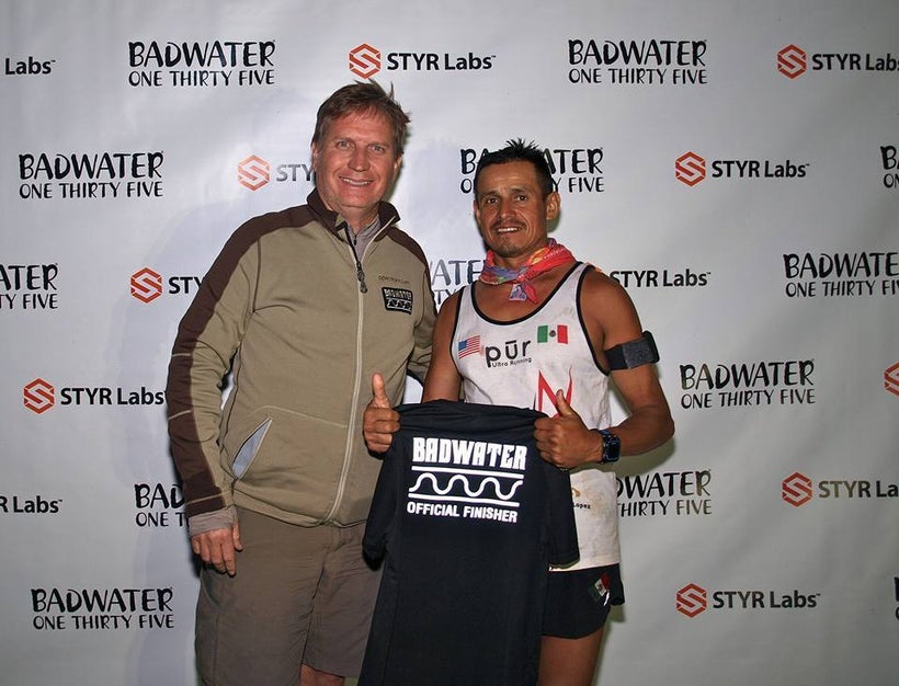 Race Director Chris Kostman with Oswaldo Lopez at finish line