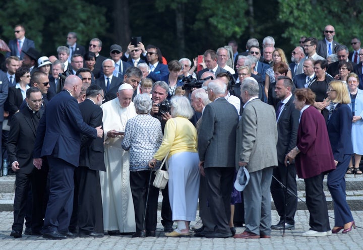 Pope Francis greets Auschwitz survivors during his visit to KL Auschwitz II-Birkenau in Brzezinka, Poland.