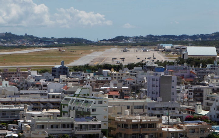 Osprey military aircraft are seen at the U.S. Futenma airbase in Ginowan, on the southern Japanese island of Okinawa, July 26