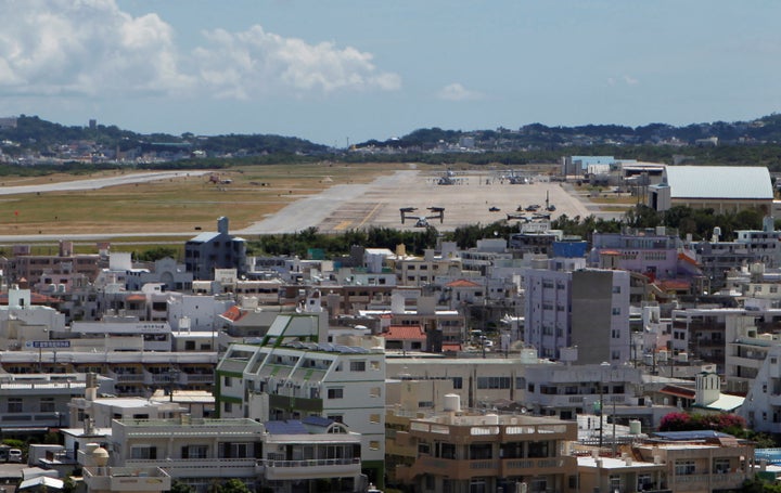 Osprey military aircraft are seen at the U.S. Futenma airbase in Ginowan, on the southern Japanese island of Okinawa, July 26, 2013.